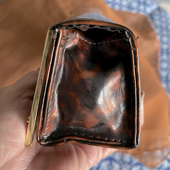 Authentic Tory Burch glass case. Animal print. Magnetic closure. Gold trim . EUC - Picture 5 of 7